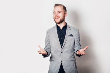 Happy grey suit guy on white background