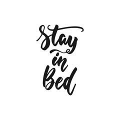 Fototapeta na wymiar Stay in bed - hand drawn lettering phrase isolated on the white background. Fun brush ink inscription for photo overlays, greeting card or print, poster design.