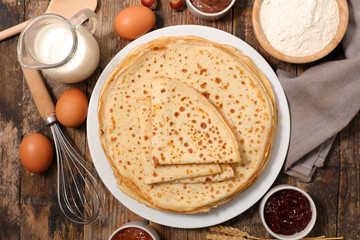 homemade crepe on wood background