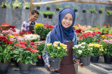 asian male and female florist