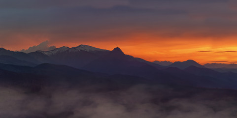 mountain panorama in the sun down