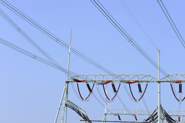 High voltage towers in the fields