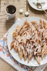 Angel wings biscuits, a traditional European sweet dish for carnival. Rustic style.