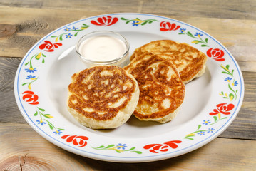 pancakes on the wooden background