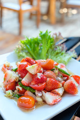 fresh strawberry spicy salad in Thai style food