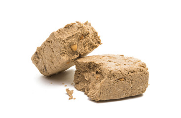 Piece of peanut halva isolated