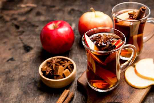 Hot Spicy Beverage. Hot Drink (apple Tea, Punch) With Cinnamon Stick And Star Anise. Seasonal Mulled Drink