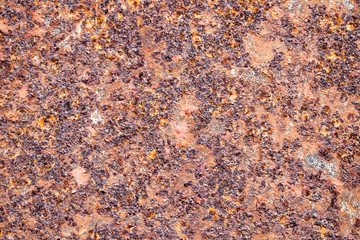 Worn dark brown rusty metal texture background