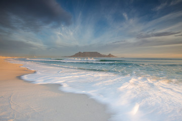 Naklejka premium Beautiful wide angle landscape image of Table Mountain in Cape Town South Africa as seen from Blouberg beach