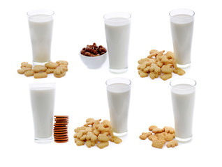 Glass of milk and cookies isolated on white background