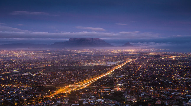 City scape over Cape Town South Africa at dawn, as seen from Tygerberg hill in the Northern Suburbs of Cape Town.