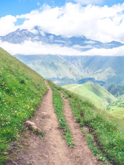 mountain road and ancient church in majestic mountains, Georgia