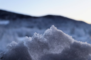 The shape of the hill created by snow
