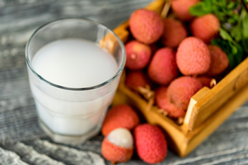 Closeup of fresh lychee juice with fruits