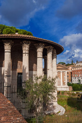 Fototapeta na wymiar Ancient roman temples of Hercules Victor and Portunus in Foro Boarium square in the historic center of Rome