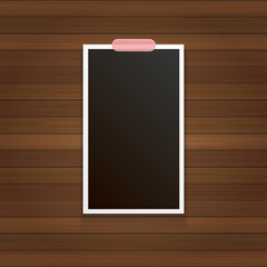 vintage photo frame with shadow isolated on wooden wall background. Vector Photo realistic Mockups with empty space for photo.