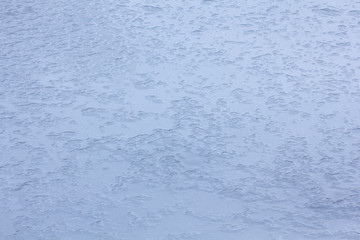 Frozen water, ice texture, winter background.