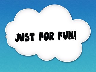 White cloud with JUST FOR FUN   message on blue sky background.