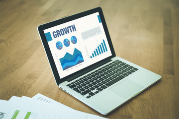 Business Charts Graphs on Screen with GROWTH Concept
