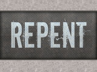 REPENT painted on metal panel wall.
