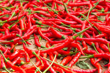 red chilli peppers in Thai weave basket