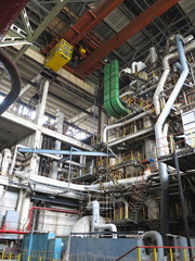 Fototapeta na wymiar steam turbine, generator, machinery, pipes, tubes, at power plant