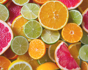 citrus fruit slices on turquoise background