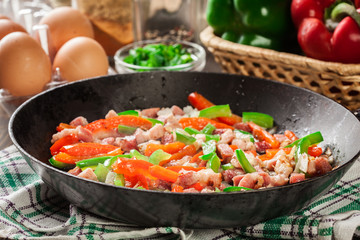 Frieding ingredients for preparing omelette