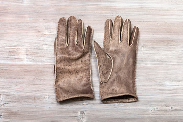 new hand-made stitched gloves on table