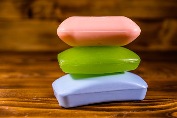 Pieces of the soap on wooden table
