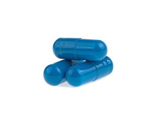 three blue capsule medicine isolated on white background