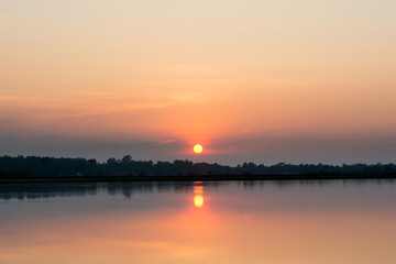 Fototapeta na wymiar sunrise in the sea, beautiful sunrise above the sea landscape background