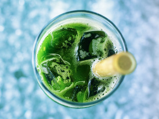 green fresh detox juice with bamboo straw