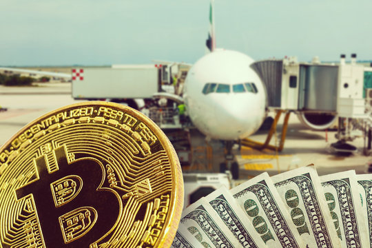 Bitcoin airplane hand airplane airport - Powered by Adobe
