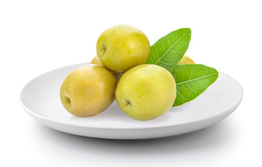 green olives in a plate isolated on a white background