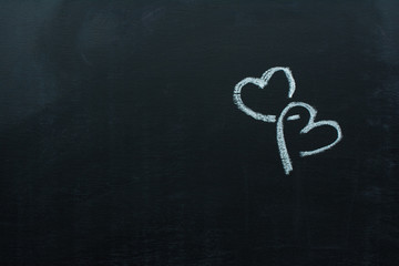 love hearts drawing on a school chalkboard