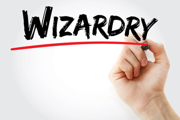 Hand writing Wizardry with marker, concept background