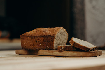 Time to eat. Close-up of sliced banana bread on a desk in the kitchen. Tasty food. Delicious eats. Healthy life
