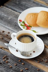 Delicious Americano coffee and pies on the table 