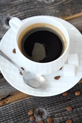 Delicious fresh Americano coffee on the wooden table 