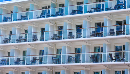 Obraz premium Chairs and Tables on Balconies