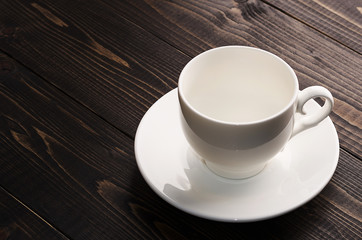  porcelain tea pairs on a dark wooden background
