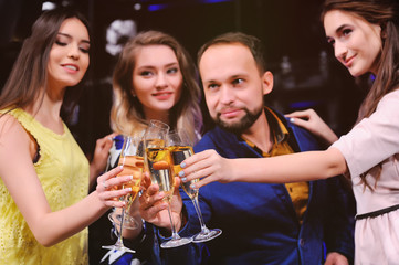 friends are celebrating the event, laughing, dancing and drinking champagne. Party