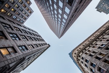 Fototapeta na wymiar Looking up at business buildings in downtown Boston, USA