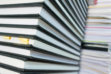 Stacks of book and paper in my office.