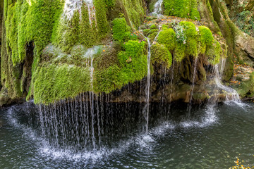 Detail of the beautiful Bigar waterfall full of green moss, Bozovici, Caras-Severin, Romania