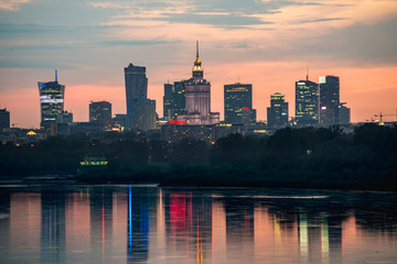 Evening panorama of Warsaw waterfront and downtown skyline - obrazy, fototapety, plakaty