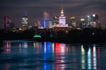 Fototapeta na wymiar Night panorama of Warsaw waterfront and downtown skyline
