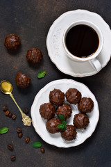 Chocolate shonfet with praline and mint with a cup of custard.