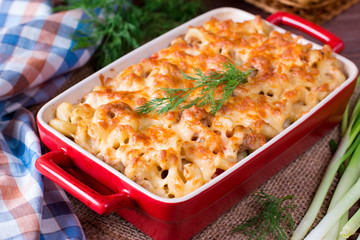 Mac and cheese, american style macaroni pasta in cheesy sauce